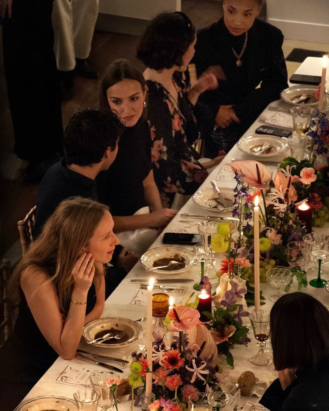 Full-service private party — guests around a styled dinner table